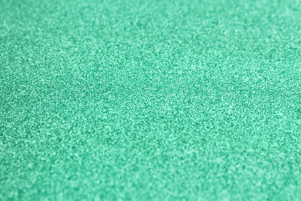 Closeup view of turquoise glitters
