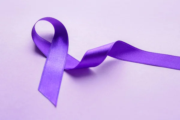 Lilac Ribbon On White Background. Cancer Concept Stock Photo, Picture and  Royalty Free Image. Image 110059751.