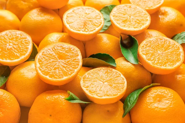Спелые вкусные мандарины в качестве фона — стоковое фото