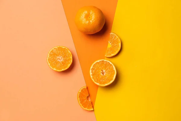 Ripe tasty tangerines on color background — Stock Photo, Image