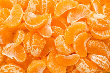 Arkaplan olarak birçok mandalina segmenti