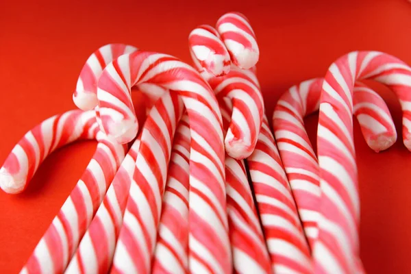 Candy canes on color background, closeup — Stock Photo, Image