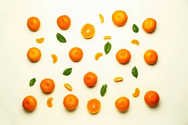 Many sweet tangerines on white background — Stock Photo, Image
