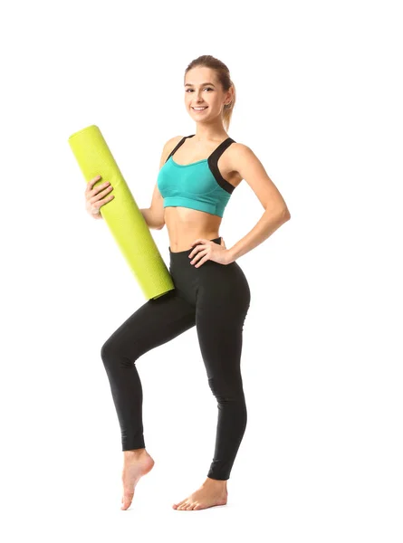 Beautiful young woman with yoga mat on white background — Stock Photo, Image