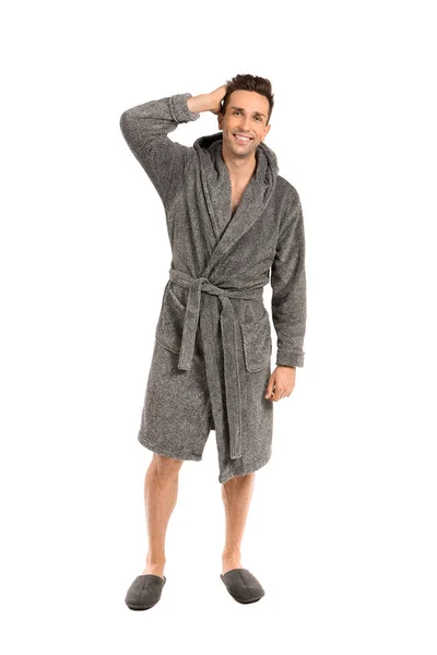 Handsome man in bathrobe on white background — Stock Photo, Image