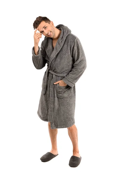 Knappe man in badjas op witte achtergrond — Stockfoto