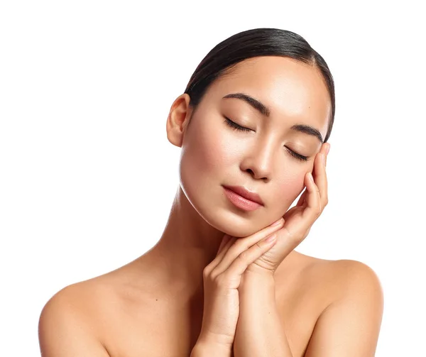 Portrait of young Asian woman with healthy skin on white background — Stock Photo, Image