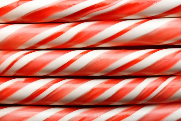Sweet candy canes as background — Stock Photo, Image