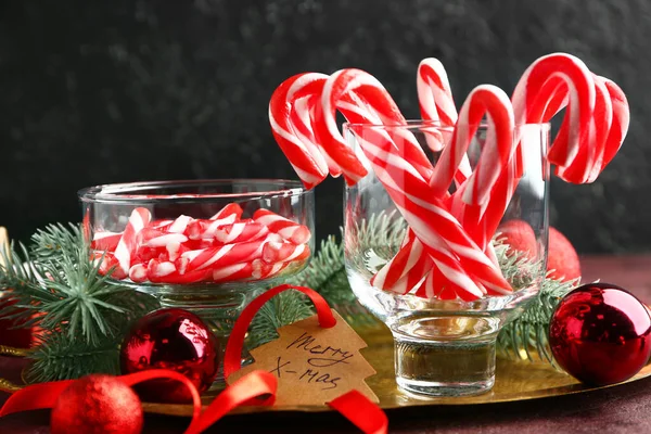 Composition with Christmas candy canes on table — Stock Photo, Image