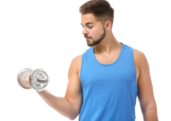 Sporty young man with dumbbell against white background — Stock Photo, Image