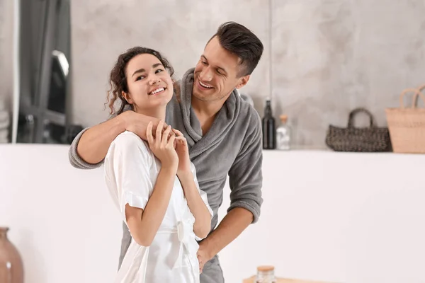 Happy young couple in bathroom at home — Stock Photo, Image