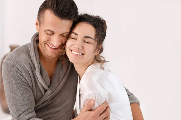 Happy young couple in bathroom at home — Stock Photo, Image