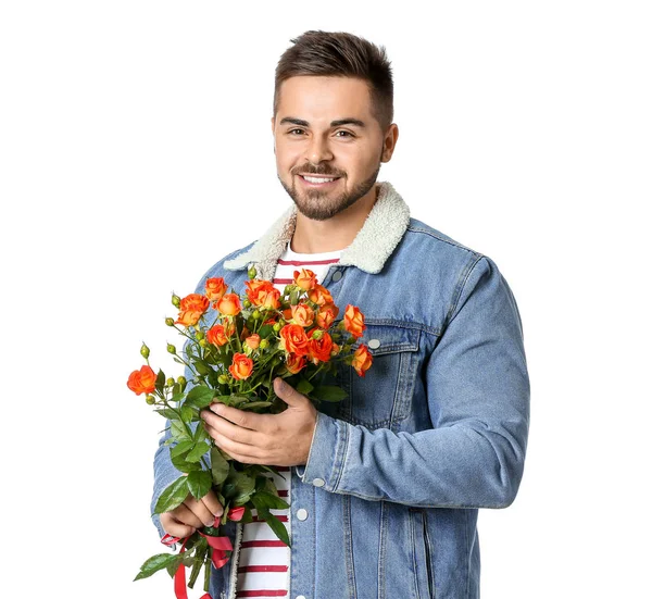 Knappe man met bloemen op witte achtergrond. Valentijnsdag — Stockfoto