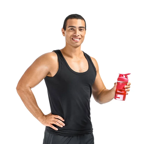 Sporty African-American man with bottle of water on white background — Stock Photo, Image