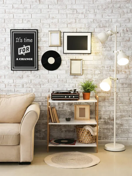 Interior of room with record player and sofa