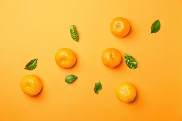 Sweet tangerines on color background — Stock Photo, Image