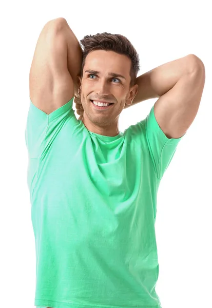 Sporty young man training against white background — Stock Photo, Image