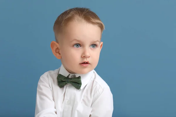 Portrait of stylish little boy on color background — Stock Photo, Image