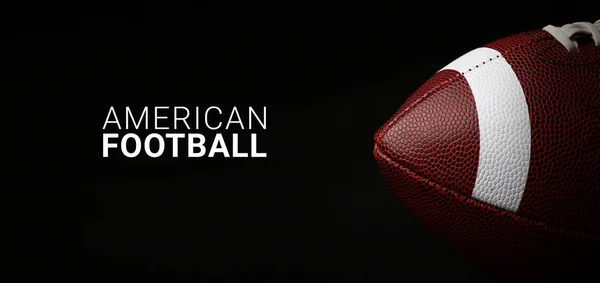 Rugby Ball und Text American Football auf dunklem Hintergrund — Stockfoto