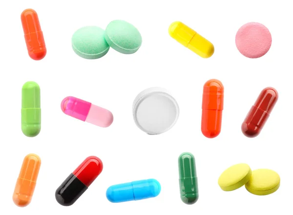 Verschillende pillen op witte achtergrond — Stockfoto