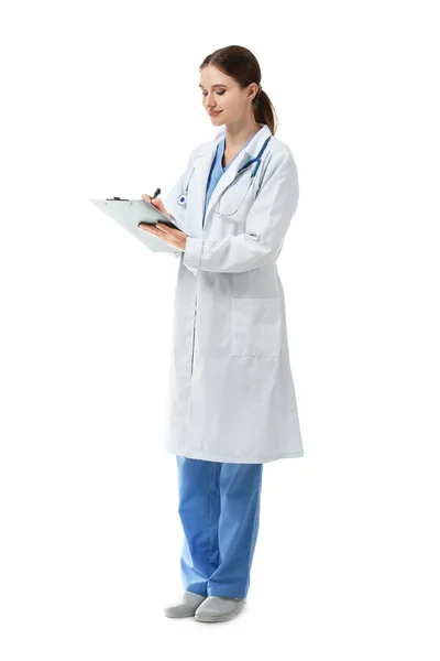 Portrait of female doctor with clipboard on white background — Stock Photo, Image