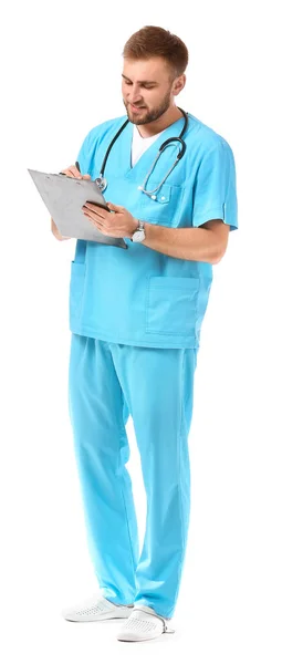 Portrait of male doctor with clipboard on white background — Stock Photo, Image