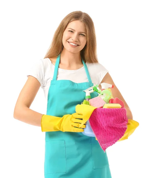 Vrouwelijke conciërge met schoonmaak leveringen op witte achtergrond — Stockfoto
