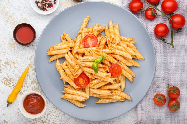 Plate with tasty pasta on light background — Stock Photo, Image