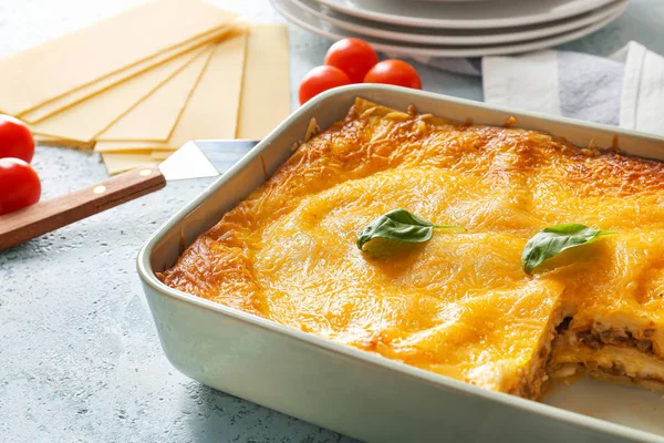 Tasty baked lasagna on table — Stock Photo, Image