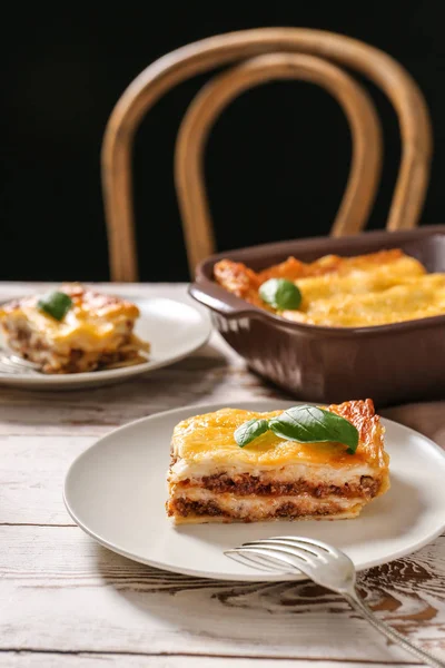 Plate with tasty baked lasagna on table — Stock Photo, Image