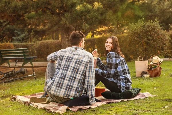 Young couple in outdoor cinema