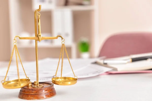 Scales of justice on lawyer's workplace — Stock Photo, Image