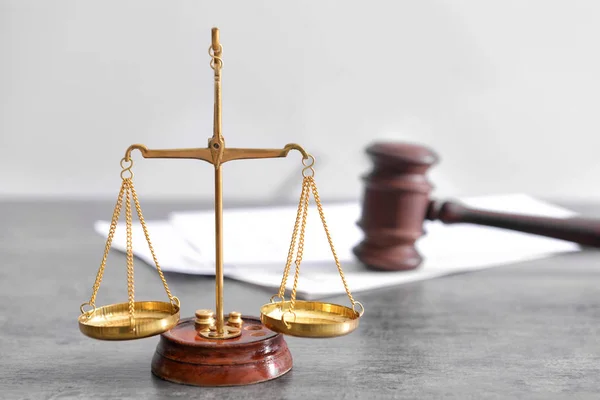 Scales of justice on lawyer's workplace — Stock Photo, Image