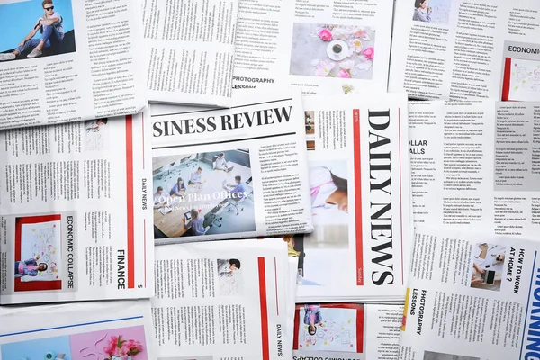 Many different newspapers as background — Stock Photo, Image