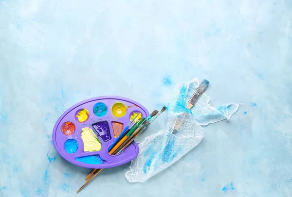Set of artist's supplies on color background — Stock Photo, Image