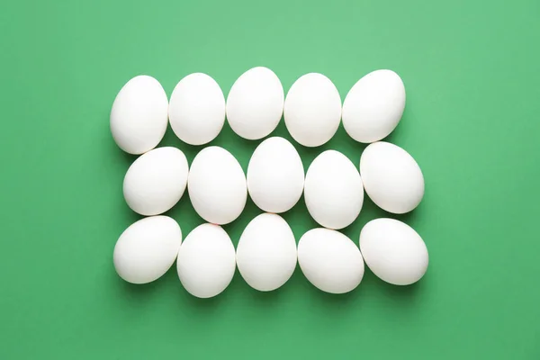 Fresh raw eggs on color background — Stock Photo, Image