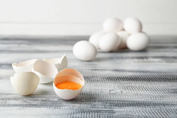 Broken raw egg on table — Stock Photo, Image