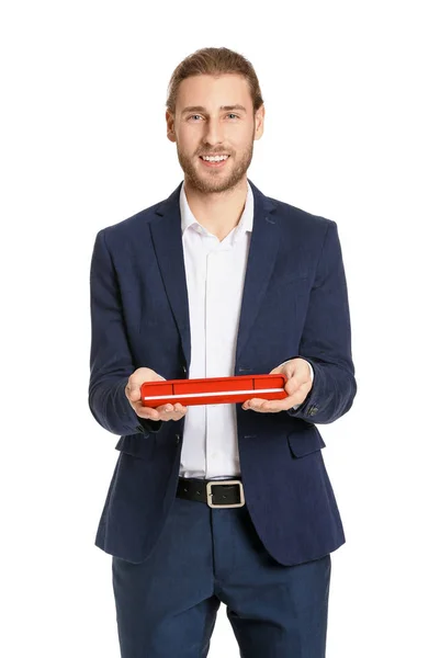 Handsome man with gift on white background. Valentine's Day celebration — Stock Photo, Image