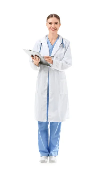 Portrait of female doctor with clipboard on white background — Stok Foto
