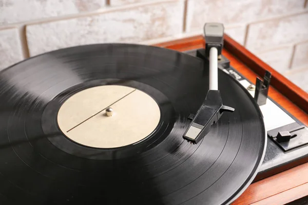 Record player with vinyl disc in room, closeup — Stock Photo, Image