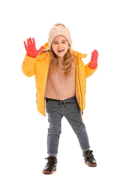 Linda niña en ropa de invierno sobre fondo blanco —  Fotos de Stock