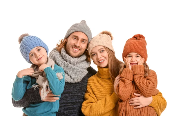 Lycklig familj i vinter kläder på vit bakgrund — Stockfoto