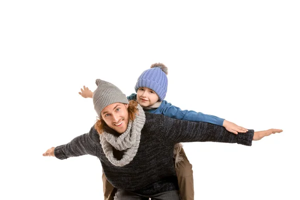 Stilig man och hans lille son i vinterkläder på vit bakgrund — Stockfoto