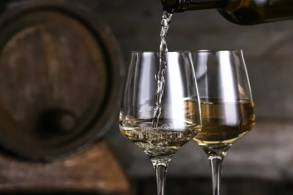 Pouring of tasty wine into glass — Stock Photo, Image