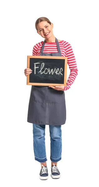 Portrét ženské květinářky držící tabuli se slovem Květina na bílém pozadí — Stock fotografie