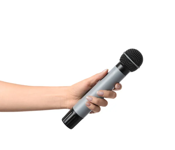 Γυναικείο χέρι με μικρόφωνο σε άσπρο φόντο — Φωτογραφία Αρχείου