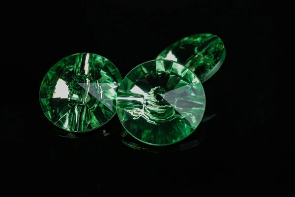 Precious stones for jewellery on dark background