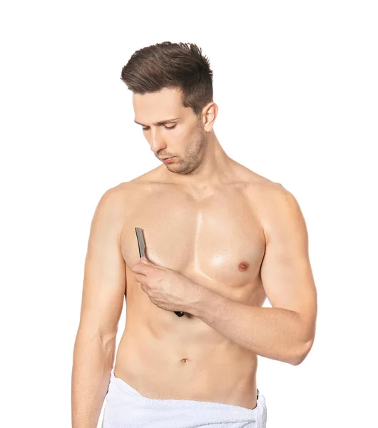 Handsome young man shaving torso on white background — Stock Photo, Image