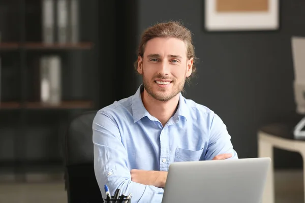 Portrait of handsome businessman in office — Stock Photo, Image