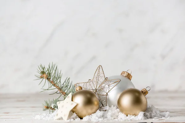 Beautiful Christmas decor with snow on white table — Stock Photo, Image